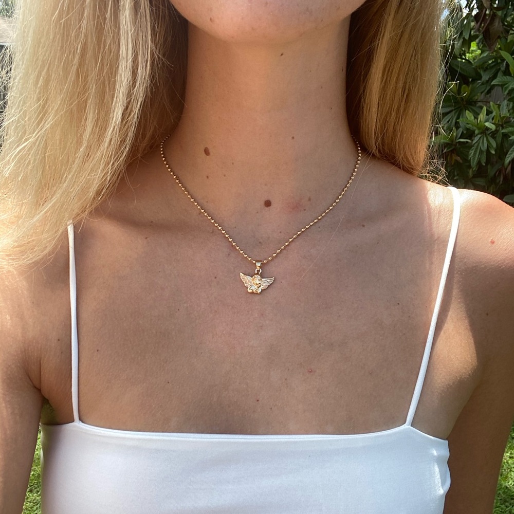 Gold Cupid angel necklace